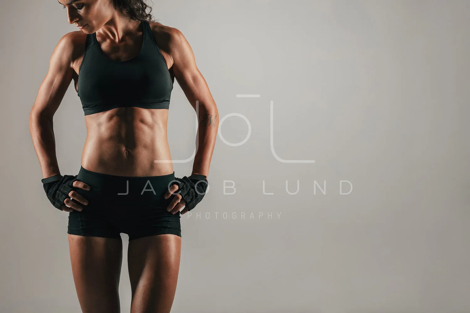 Athletic woman with strong abdominal muscles