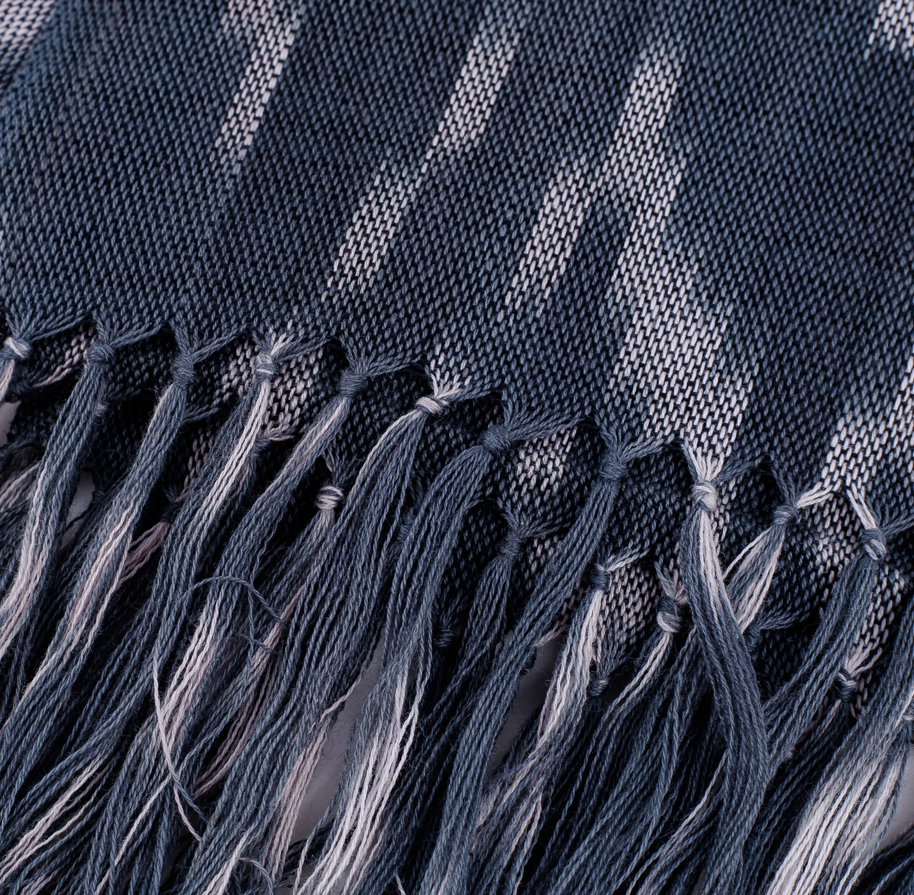 Handwoven Ikat Patterned Blue Cotton Scarf with Fringes - Blue Frequencies | NOVICA